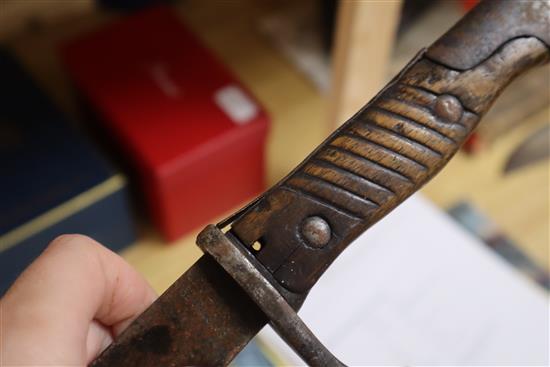 A kukri and a bayonet